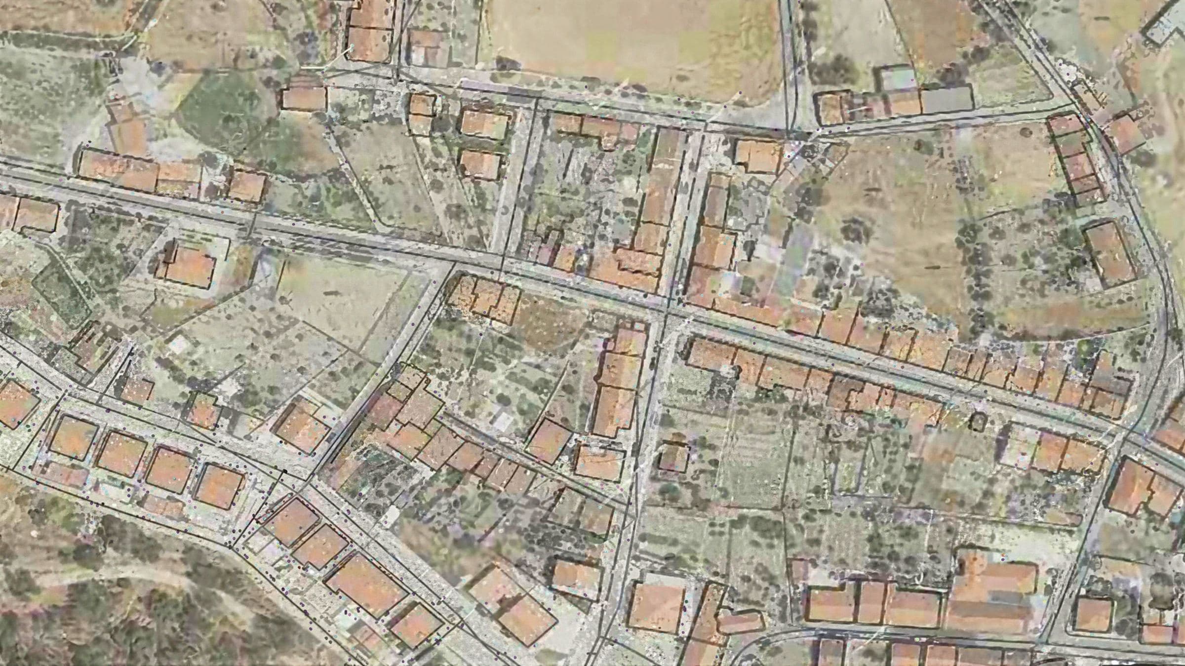 Ortofoto de um bairro, com quadras, lotes e ruas vistos de cima